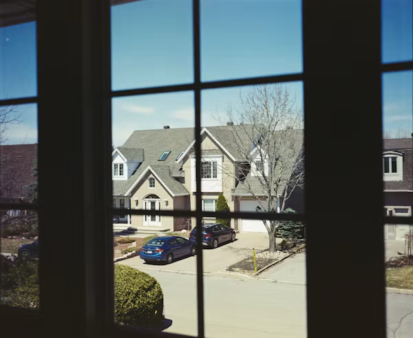 Professional window tint installation on residential windows.